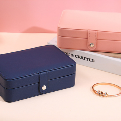 Boîte à bijoux en cuir compacte